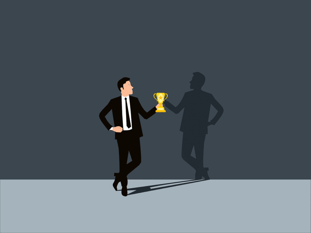 Home 1 Man handing a trophy to his tired shadow — a symbol of personal victory, mindset growth, and the real journey within.