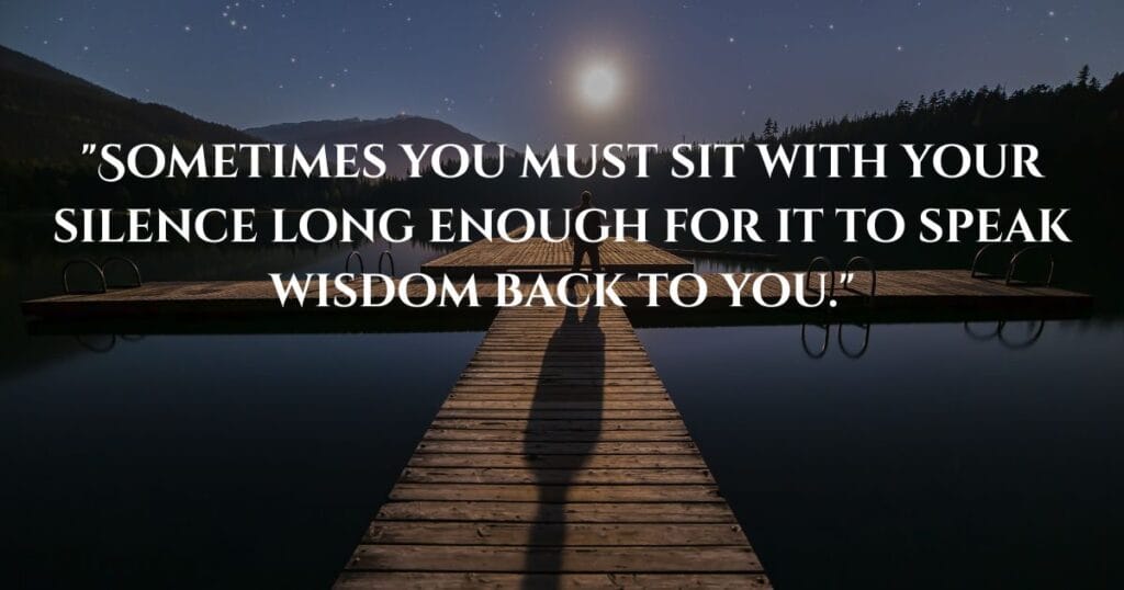 Inspiring Loneliness Quotes To Help You Feel Less Alone 5 A lone boy standing on a wooden dock at night, gazing at a starlit sky over a calm lake.